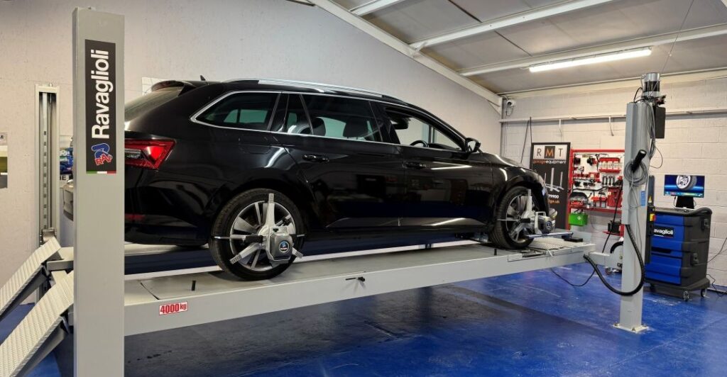 Four-wheel alignment training using industry-leading alignment systems