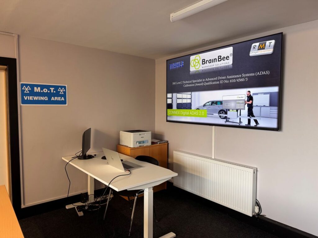ADAS calibration training presentation displayed during IMI-approved automotive training at RMT Automotive Services